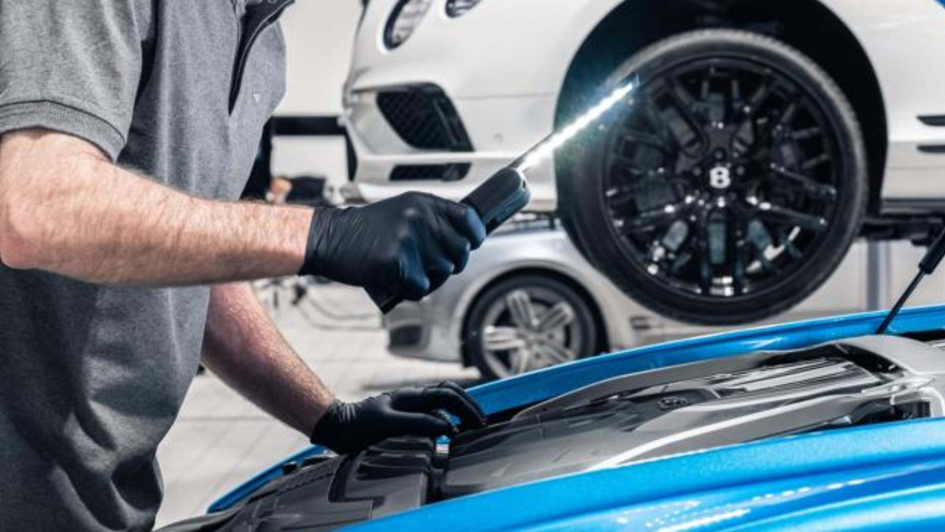 Close up of Bentley engine being serviced