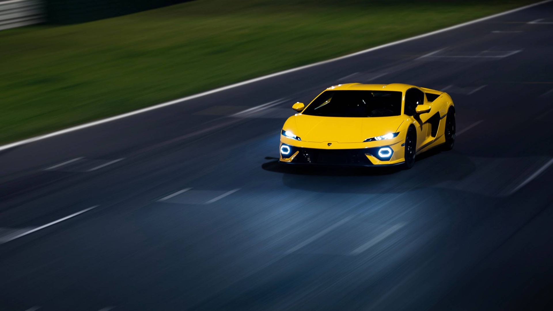 Yellow Lamborghini Temerario driving on the road