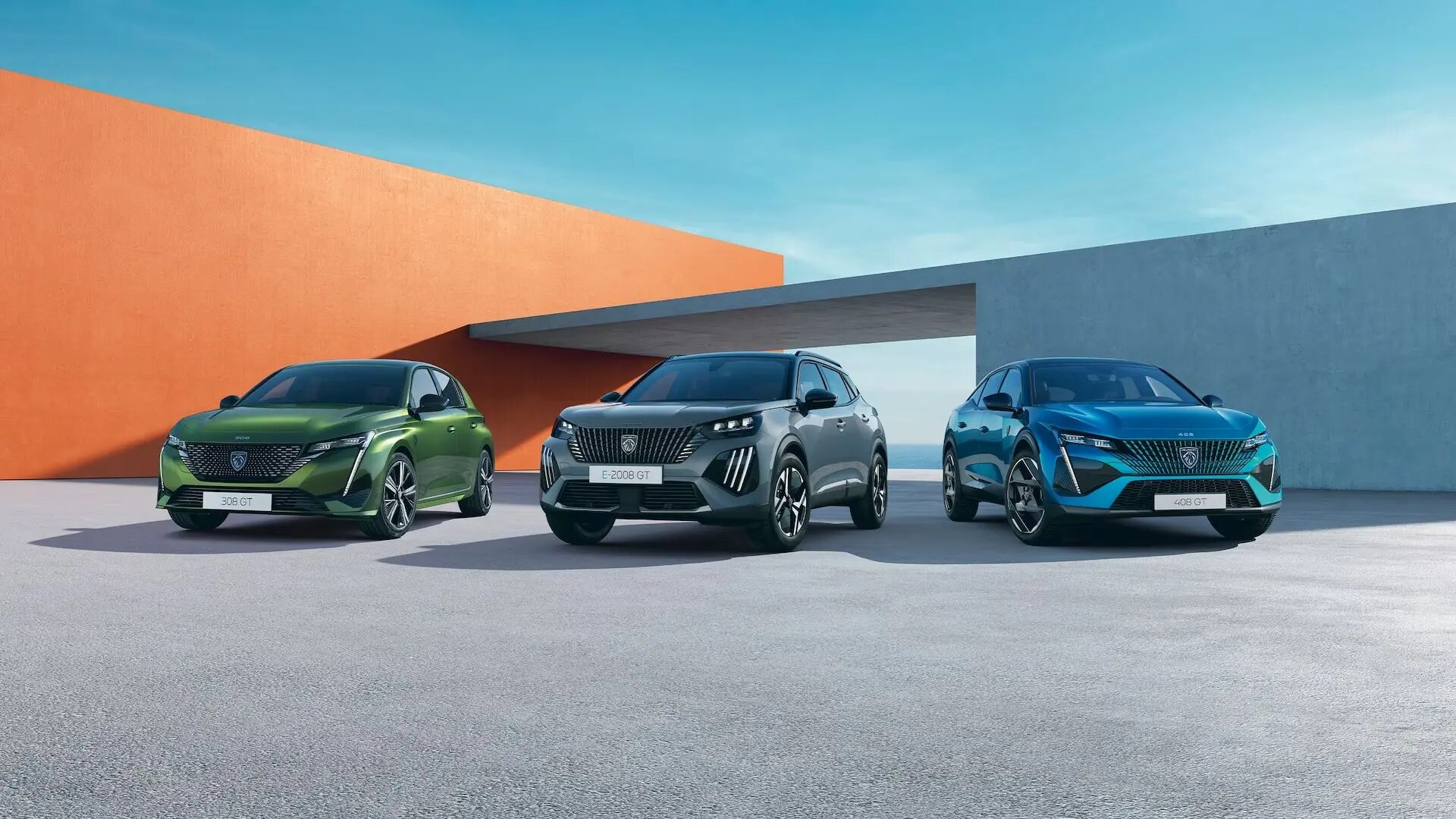 3 Peugeot cars facing outwards parked 