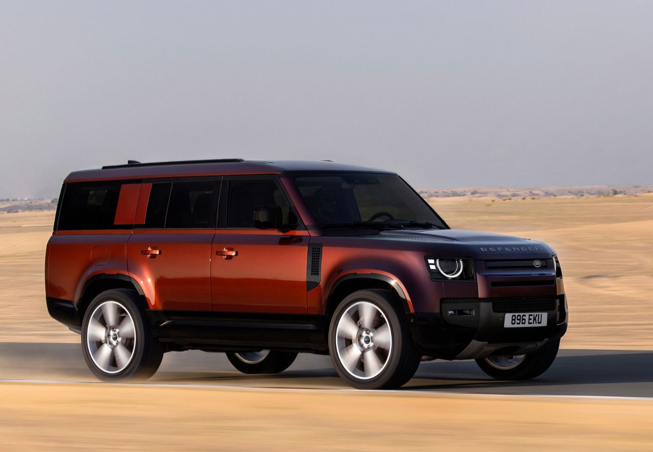 Defender 130 driving over sand